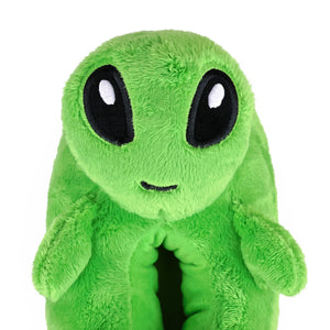Green plush Alien Slipper with large black eyes on a white background, close up view of face