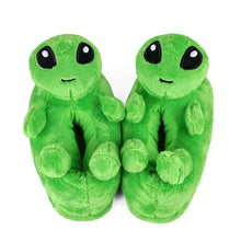Pair of green alien slippers on a white background