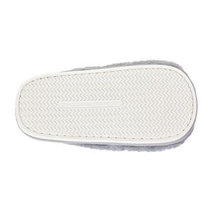 White slipper sole with textured pattern on a white background