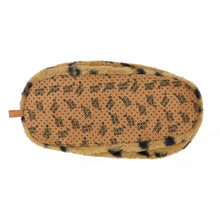 Bottom of plush Harbor Seal slipper, showing faux suede sole with non-slip grips