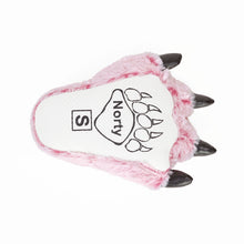 Kids pink tiger paw slipper seen from below.  Sole is made of white fabric with non-slip grips, and says Norty with the image of a bear paw, and a letter S for small.