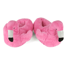 Pair of pink flamingo slippers on a white background
