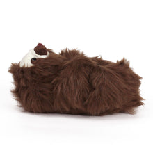 Fuzzy Sloth Slipper seen from the side on a white background