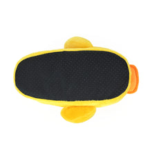 Yellow plush slipper shaped like a duck seen from the bottom showing black fabric footbed with non-slip grips